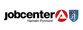 Logo of Jobcenter Hameln-Pyrmont featuring text and a coat of arms.